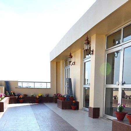 Hotel Tulip Residency Dibrugarh Esterno foto